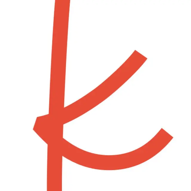 The image shows a stylized red letter "K" with a unique design that features angular lines and a half-circle curve.