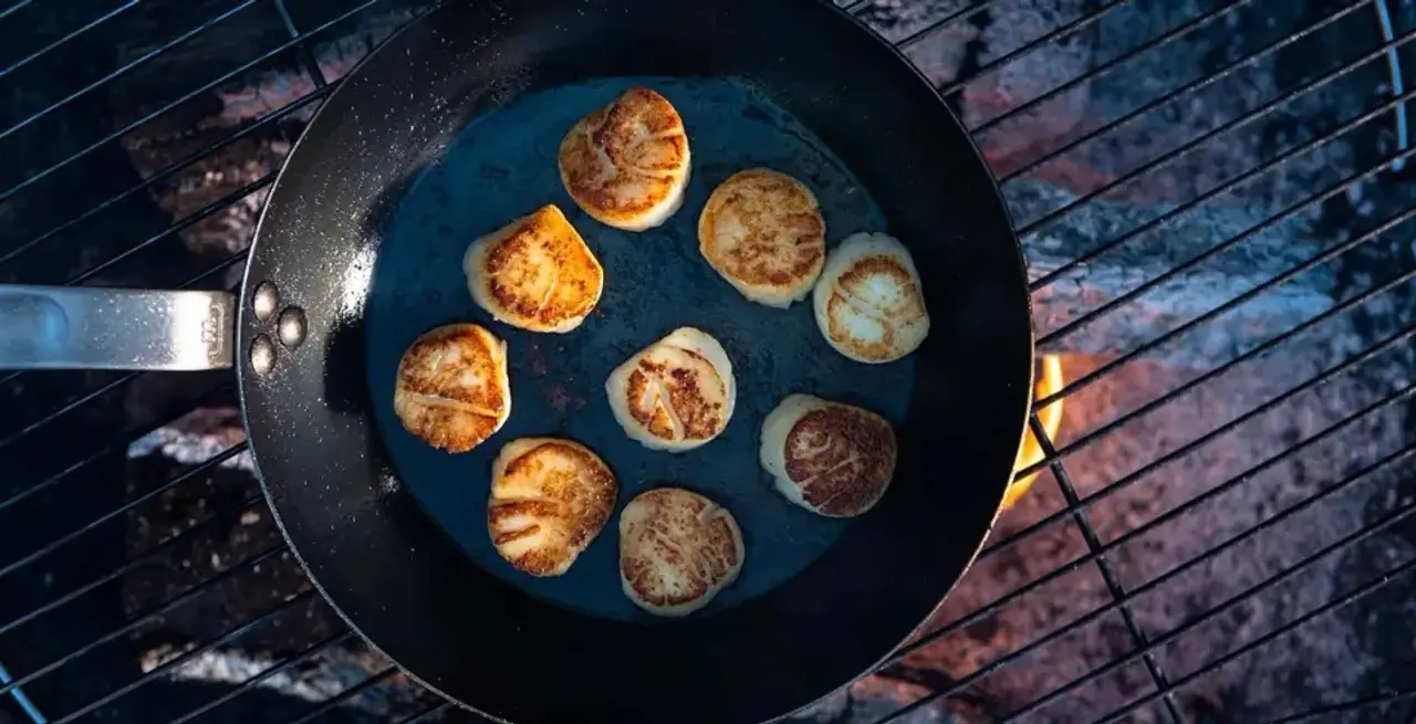 carbon frying pan on grill